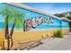 Colorful Dunedin mural featuring local scenes and landmarks, capturing the essence of the charming beach town at 2451 Baywood W Dr, Dunedin, FL 34698