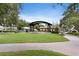 Picturesque town park with lush green lawns and gazebo, offering a peaceful retreat in a charming Dunedin community at 2451 Baywood W Dr, Dunedin, FL 34698