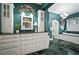 Elegant bathroom showcasing a large vanity with dual sinks and a luxurious soaking tub at 2906 Pemberton Creek Dr, Seffner, FL 33584