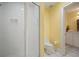 Bathroom features tiled walk-in shower and vanity with storage at 2906 Pemberton Creek Dr, Seffner, FL 33584