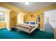 Bright bedroom featuring patriotic themed decor, natural light and contrasting colors at 2906 Pemberton Creek Dr, Seffner, FL 33584