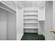 Walk-in closet with built-in shelving and ample storage space for organization at 2906 Pemberton Creek Dr, Seffner, FL 33584