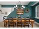 Cozy dining room with wooden table, comfortable seating, stylish decor, and natural light at 2906 Pemberton Creek Dr, Seffner, FL 33584