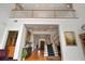 Expansive foyer featuring a staircase, open floor plan, and elegant decor, enhancing the home's charm at 2906 Pemberton Creek Dr, Seffner, FL 33584