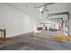 Spacious garage features ample room for vehicles, storage, and projects at 2906 Pemberton Creek Dr, Seffner, FL 33584