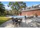 Backyard pool area with ample seating, perfect for relaxation and outdoor enjoyment at 2906 Pemberton Creek Dr, Seffner, FL 33584