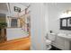 Powder room with tiled floor and pedestal sink at 2906 Pemberton Creek Dr, Seffner, FL 33584