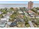 Aerial view showing the property's location near the water and an apartment building at 2915 W Bay View Ave, Tampa, FL 33611