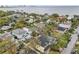 An aerial view of a neighborhood showcasing the houses, trees and waterfront at 2915 W Bay View Ave, Tampa, FL 33611