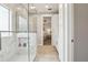 Bright bathroom featuring a glass enclosed shower, and stylish vanities at 2915 W Bay View Ave, Tampa, FL 33611