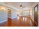 Bright living room featuring hardwood floors, neutral walls, and ample natural light at 3007 W Angeles St, Tampa, FL 33629
