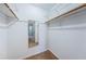 Walk-in closet offering ample storage space with shelving and hanging rods at 3010 59Th S St # 314, Gulfport, FL 33707