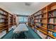 Library featuring floor to ceiling bookshelves and a table for quiet reading and studying at 3010 59Th S St # 314, Gulfport, FL 33707