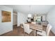 Open concept living and dining area with stylish furnishings, ample natural light, and cozy decor at 3010 59Th S St # 314, Gulfport, FL 33707