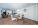 Open-concept living and dining space with abundant natural light and comfortable seating at 3010 59Th S St # 314, Gulfport, FL 33707