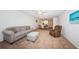 Comfortable living room with neutral color scheme, carpet, and open access to the dining area at 3010 59Th S St # 314, Gulfport, FL 33707