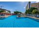 Exterior shot of the community pool featuring an additional shallow end for to enjoy at 3010 59Th S St # 314, Gulfport, FL 33707