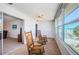 Sun room with rocking chairs and a sliding glass door at 3010 59Th S St # 314, Gulfport, FL 33707