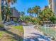 Water feature with pond offers a scenic bridge, fountain, and peaceful surroundings at 3021 Countryside Blvd # 23A, Clearwater, FL 33761