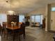 Open living space featuring a dining area and bright windows with natural light at 3207 Sunwatch Dr, Wesley Chapel, FL 33544