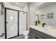 Modern bathroom boasts a sleek glass-enclosed shower, elegant vanity, and stylish fixtures for a spa-like experience at 3470 Timber Crossing Ave, Brandon, FL 33511