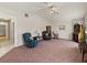 Inviting living room with vaulted ceiling and cozy furniture at 36916 Lake Pasadena Rd, Dade City, FL 33525