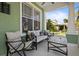 Inviting front porch with comfortable seating, perfect for relaxing and enjoying the neighborhood views at 3749 Zachary St, New Port Richey, FL 34655