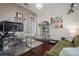 Home office features hardwood floors, an accent wall, and natural lighting at 3749 Zachary St, New Port Richey, FL 34655