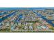 Aerial view of waterfront community with canals providing access to the Gulf of America at 4291 Flexer Dr, Hernando Beach, FL 34607