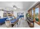 Dining area with table, kitchen view, and natural light from windows at 4291 Flexer Dr, Hernando Beach, FL 34607
