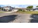Inviting one-story home boasts a stone facade, attached garage, and a green lawn, creating curb appeal at 4291 Flexer Dr, Hernando Beach, FL 34607