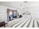 Bedroom with a sliding glass door that leads to a sunroom at 4291 Flexer Dr, Hernando Beach, FL 34607