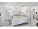 Serene bedroom with white furniture and en-suite bathroom at 4291 Flexer Dr, Hernando Beach, FL 34607