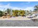 Outdoor patio area with lounge chairs, a picnic table, and views of the waterway at 4291 Flexer Dr, Hernando Beach, FL 34607