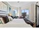 Primary bedroom with city views, a desk, and a large bed at 449 S 12Th St # 1705, Tampa, FL 33602