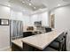 Modern kitchen featuring stainless steel appliances, white cabinets, and a light marble countertop island at 449 S 12Th St # 1705, Tampa, FL 33602