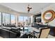 Bright living room featuring city views, hardwood floors, comfortable seating, and modern decor at 449 S 12Th St # 1705, Tampa, FL 33602