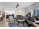 Spacious living area with open layout into the kitchen, complete with dining set, seating, and decor at 449 S 12Th St # 1705, Tampa, FL 33602
