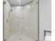 Modern shower with tiled walls and glass door at 449 S 12Th St # 1705, Tampa, FL 33602