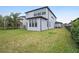 Spacious backyard with lush green grass at 4575 Tivoli Dr, Wesley Chapel, FL 33543