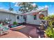 Cozy backyard with shade and seating at 4831 Fairfield S Ave, St Petersburg, FL 33711