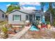 Charming single-story home with inviting front porch, decorative accents, and a freshly painted exterior at 4831 Fairfield S Ave, St Petersburg, FL 33711