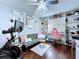 Bonus room features exercise bike, daybed and shelves at 513 Hammock Pine Blvd, Clearwater, FL 33761