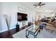 Open floor plan with a view from the living room to the dining room and kitchen at 513 Hammock Pine Blvd, Clearwater, FL 33761