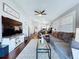 Open floor plan with a view from the living room to the dining room and kitchen at 513 Hammock Pine Blvd, Clearwater, FL 33761