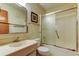 Bathroom with a shower-tub combo and framed mirror at 5521 80Th N St # 315, St Petersburg, FL 33709
