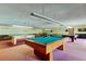 Billiards room featuring multiple pool tables and comfortable seating at 5521 80Th N St # 315, St Petersburg, FL 33709