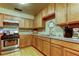 Cozy kitchen featuring stainless steel appliances and ample cabinet space at 5521 80Th N St # 315, St Petersburg, FL 33709