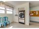 Community laundry room with stacked machines at 5521 80Th N St # 315, St Petersburg, FL 33709