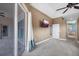 Bedroom featuring carpet, ceiling fan, and sliding doors to an outdoor patio at 5703 Tanagerside Rd, Lithia, FL 33547